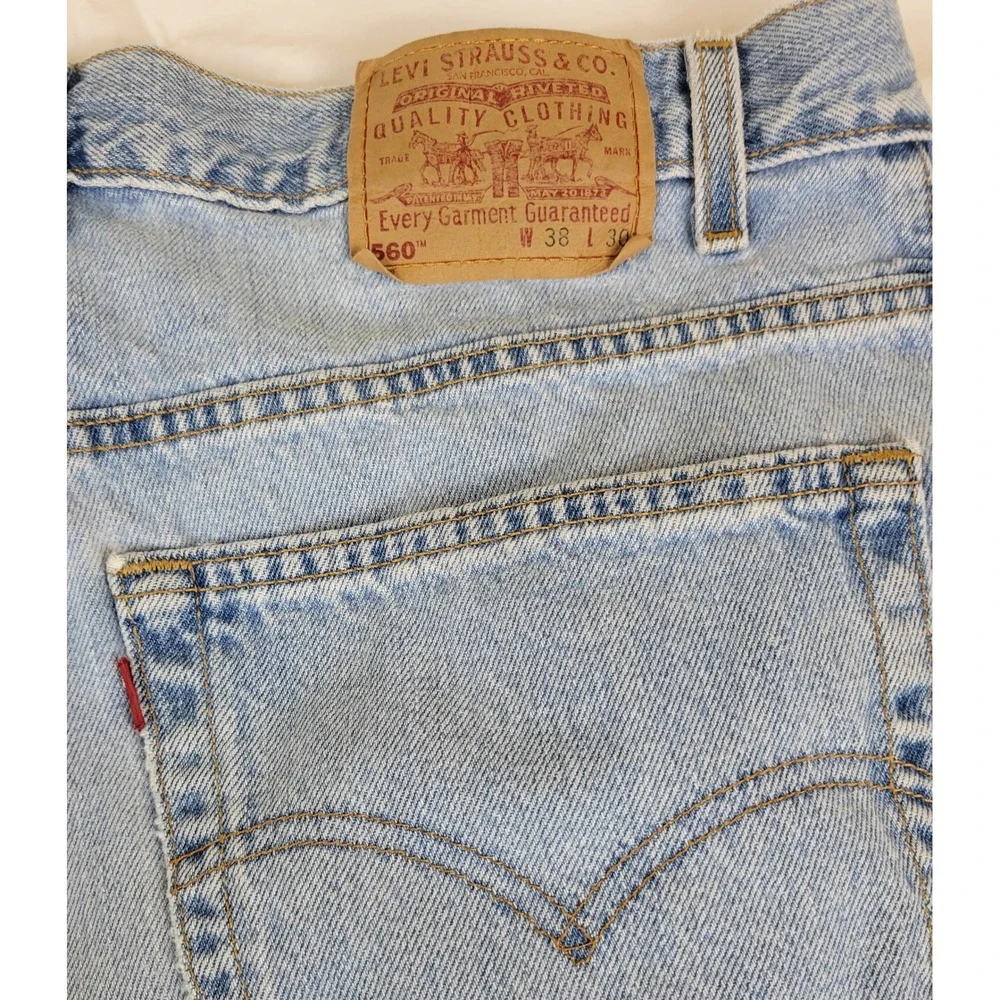 Vintage Levi's 560 Mens Jeans Light Wash Loose Fit Tapered‎ Leg W37 L30 USA